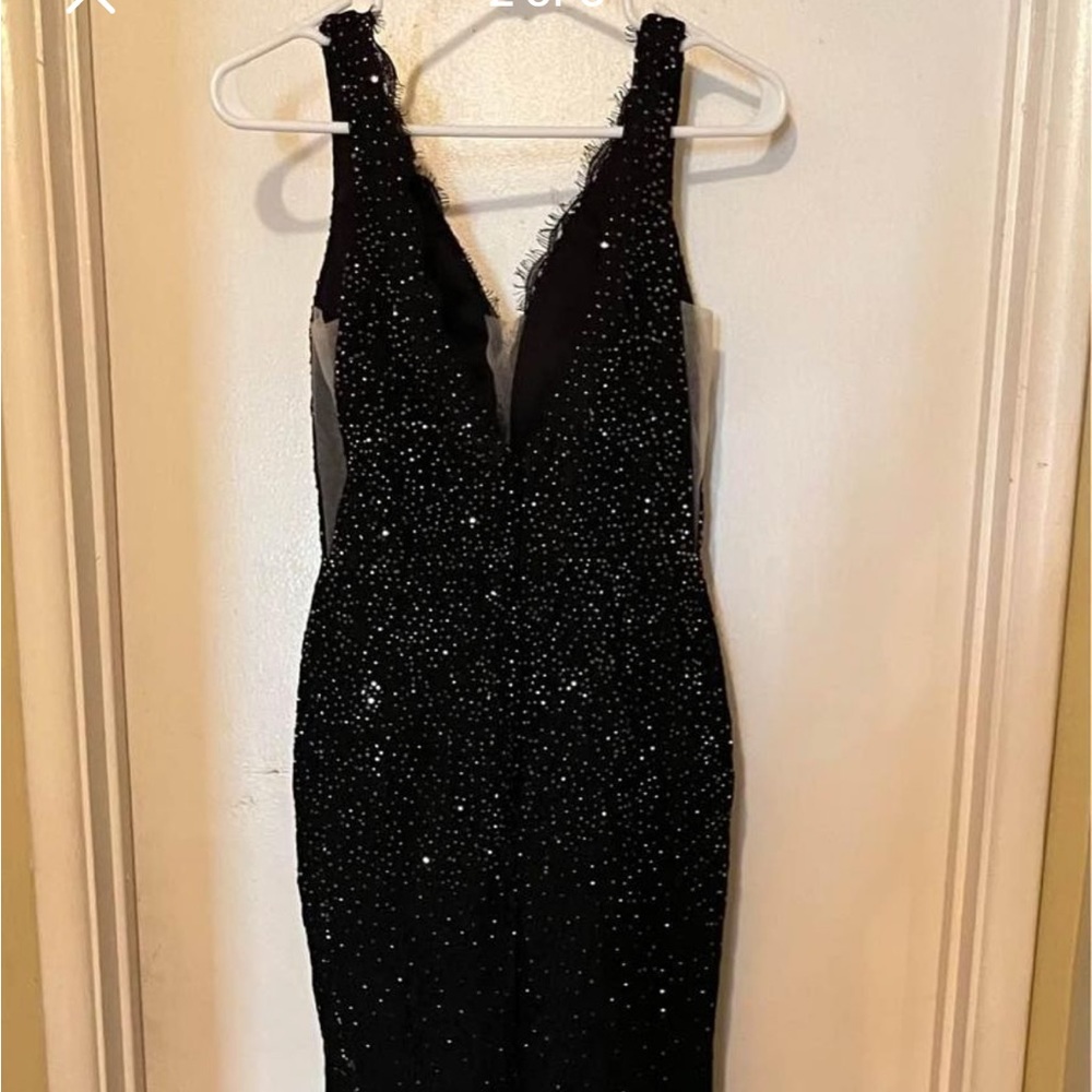 Never worn. We received it after prom